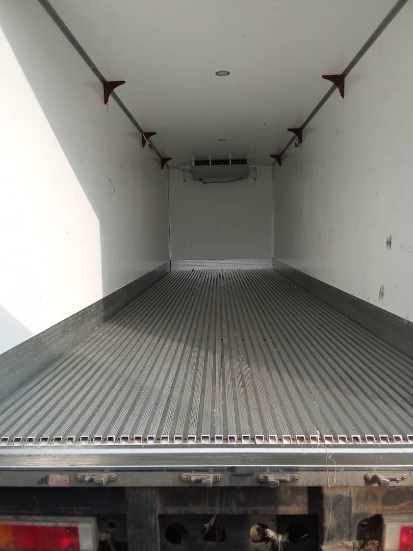 Insulated empty cargo hold of a Korlun refrigerated truck