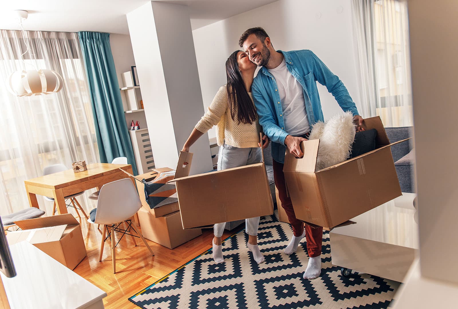 Movers carrying furniture during a home move in Abuja