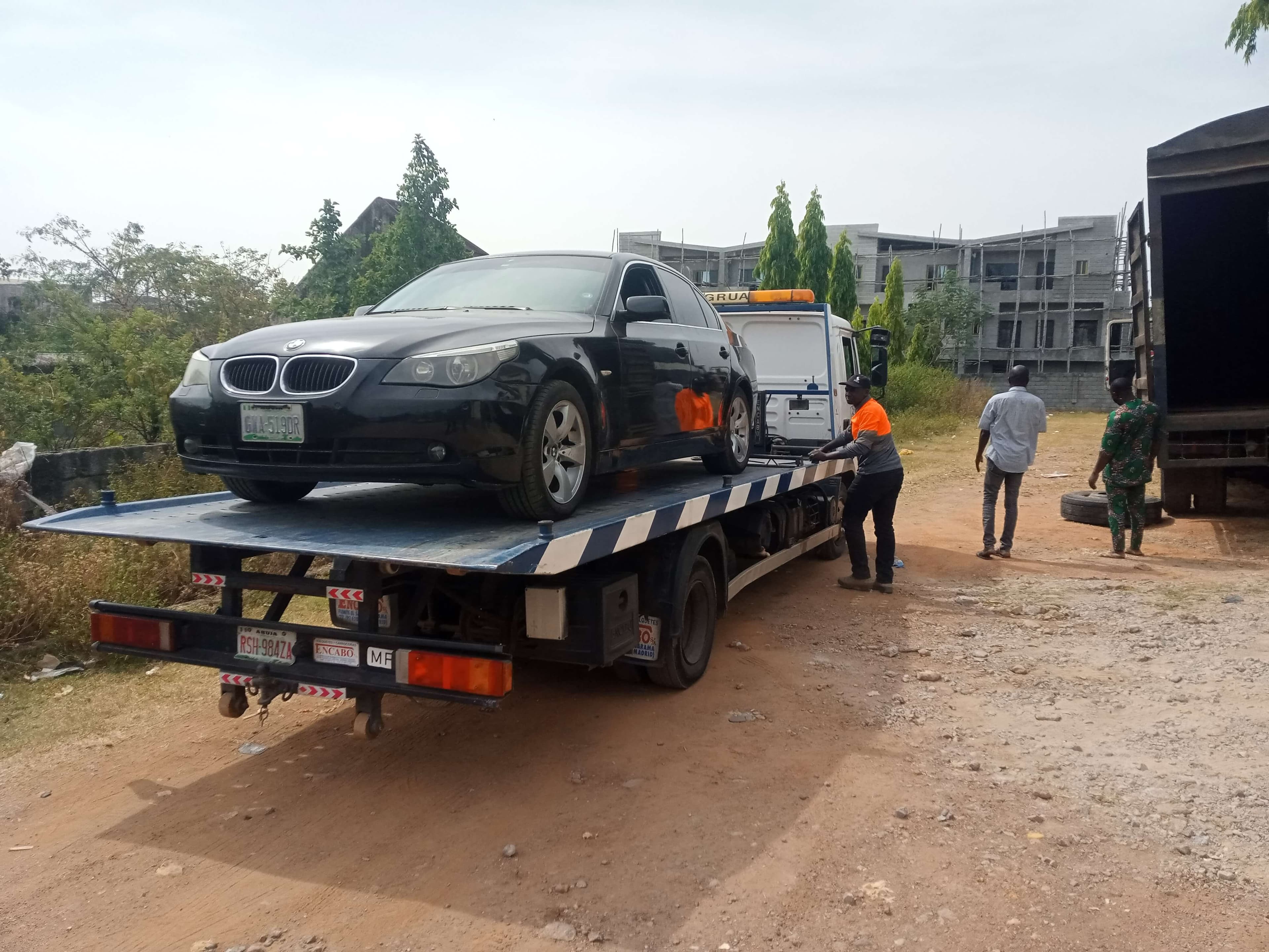 Korlun flatbed car carrier transporting a vehicle in Abuja