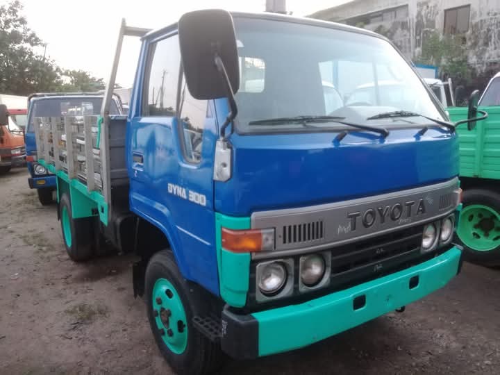 Korlun Dyna flatbed truck available for rental in Abuja