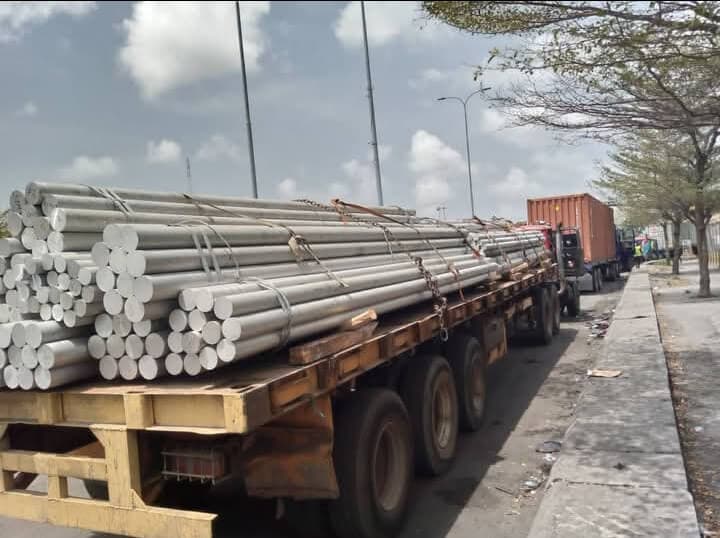 Korlun flatbed trailer loaded with steel rods