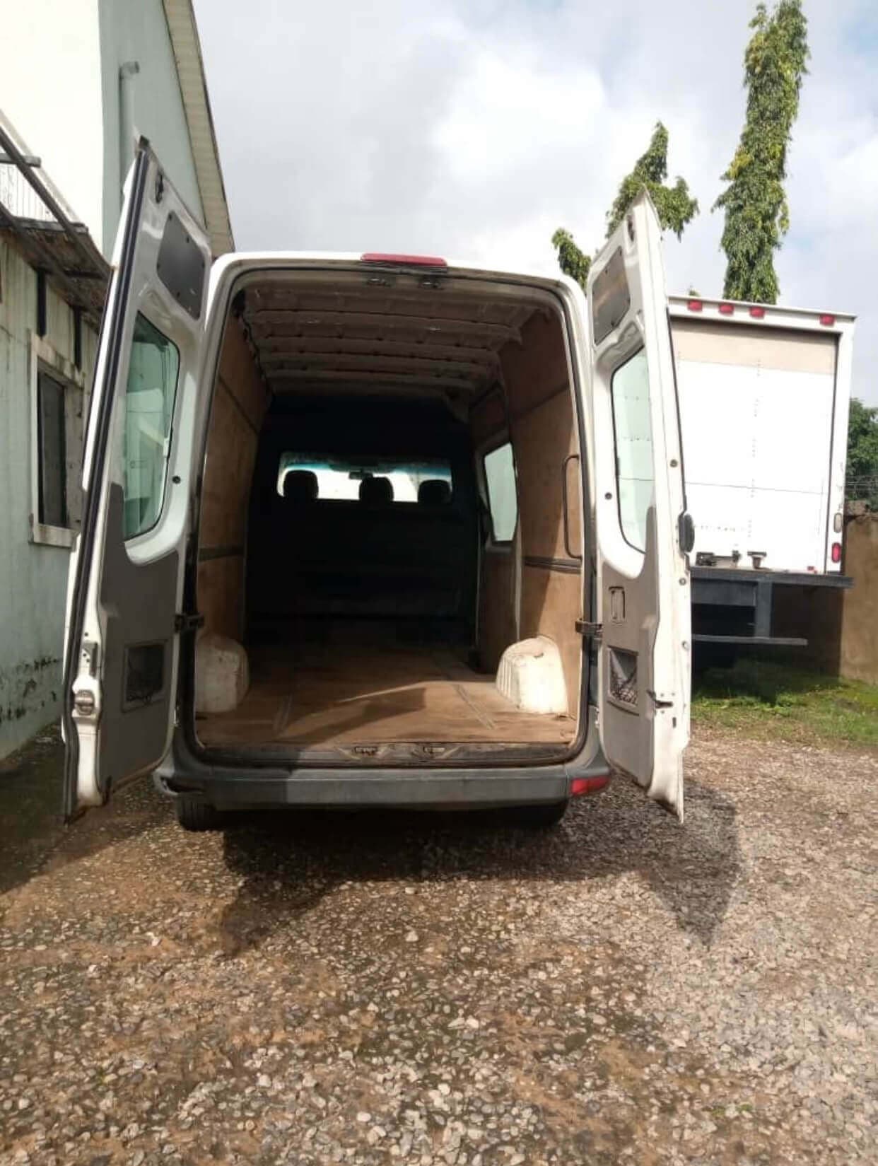 Empty enclosed cargo area of a Korlun large van